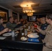 Rear Adm. Cruz and Rear Adm. Ciappina attend have lunch with staff aboard Abraham Lincoln