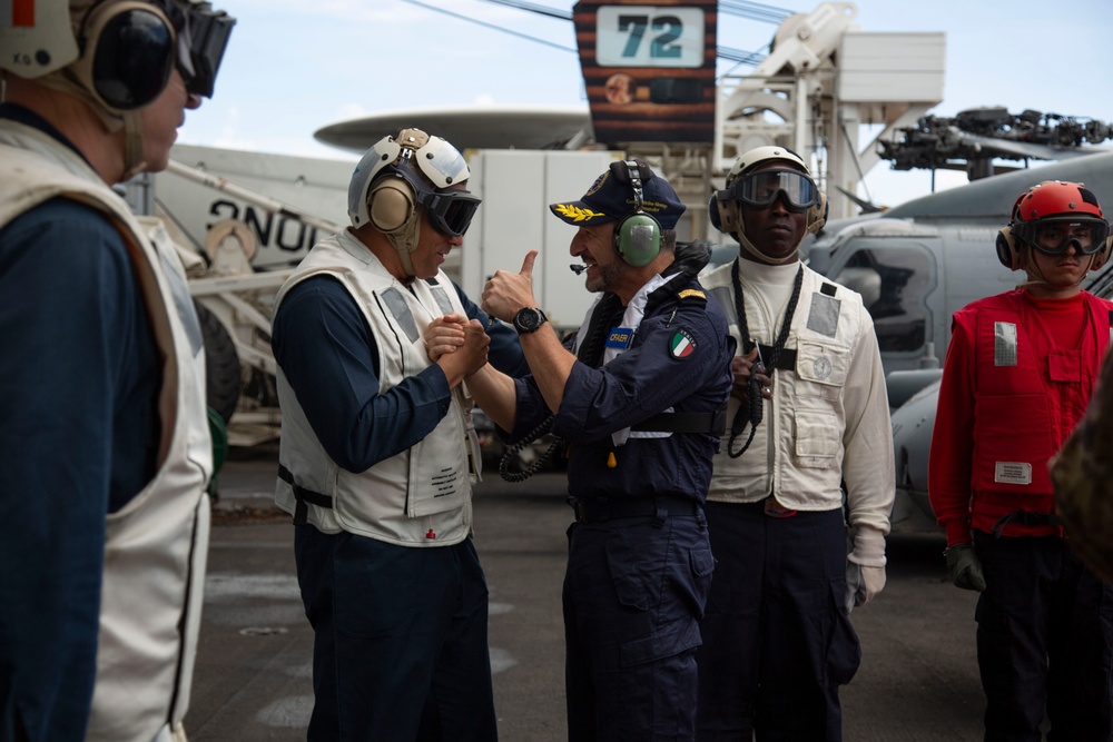 Rear Adm. Giancarlo Ciappina arrives aboard USS Abraham Lincoln