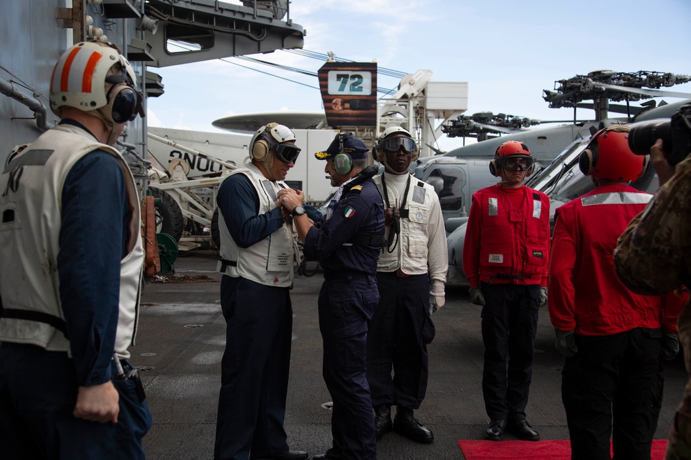 Rear Adm. Giancarlo Ciappina arrives aboard USS Abraham Lincoln