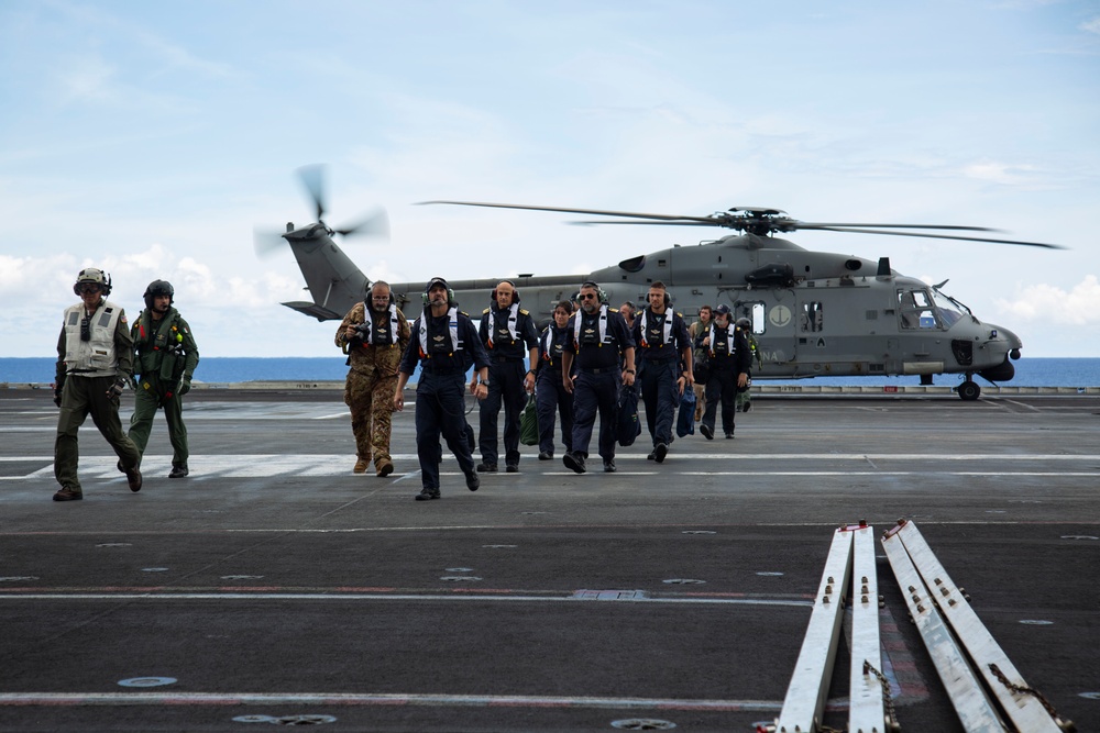 Rear Adm. Giancarlo Ciappina arrives aboard USS Abraham Lincoln