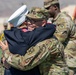 Mother pins new rank on son in emotional promotion ceremony