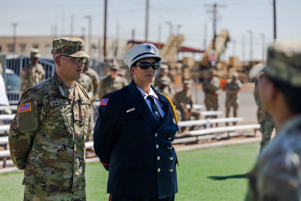 Mother pins new rank on son in emotional promotion ceremony