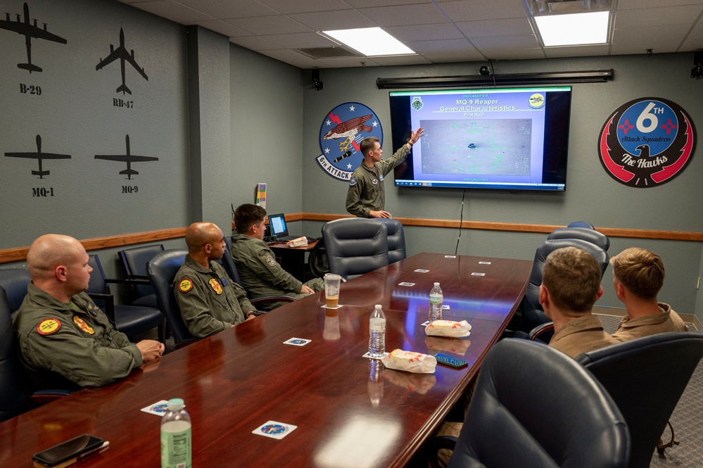 6th Attack Squadron hosts Marine Corps pilots for partnership tour