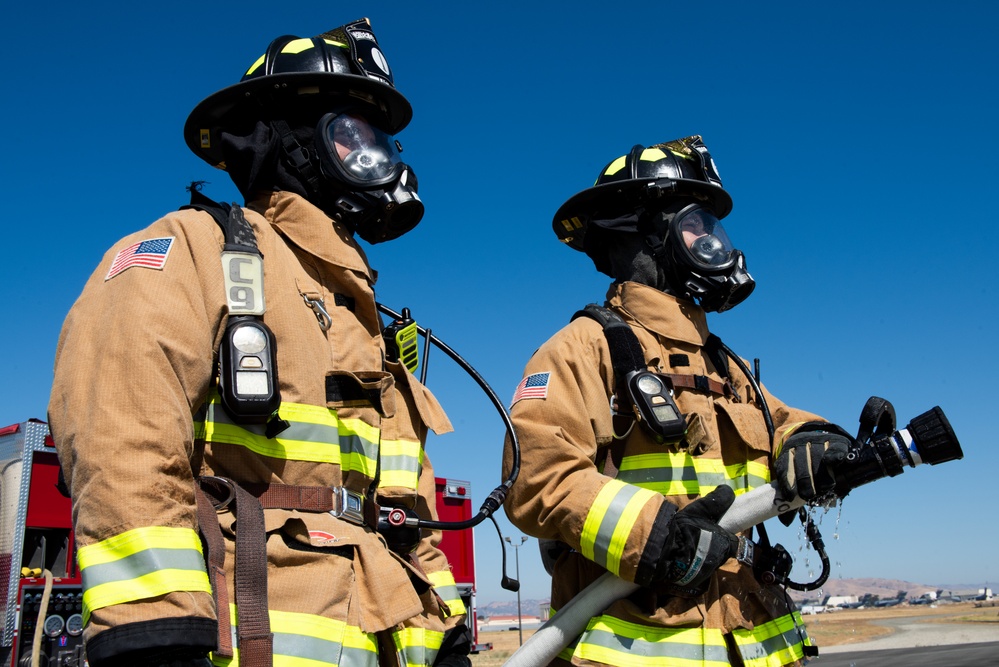 60th CES conducts live-burn training with local fire department