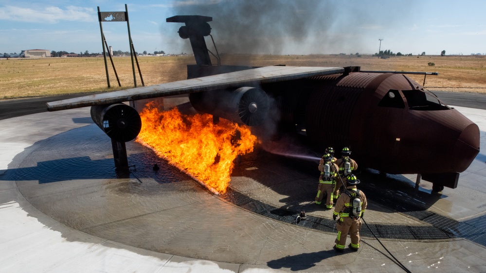 60th CES conducts live-burn training with local fire department