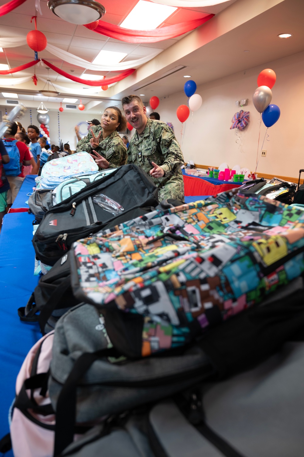 Sailors Volunteer at Tampa Housing Authority’s Back to School Bash