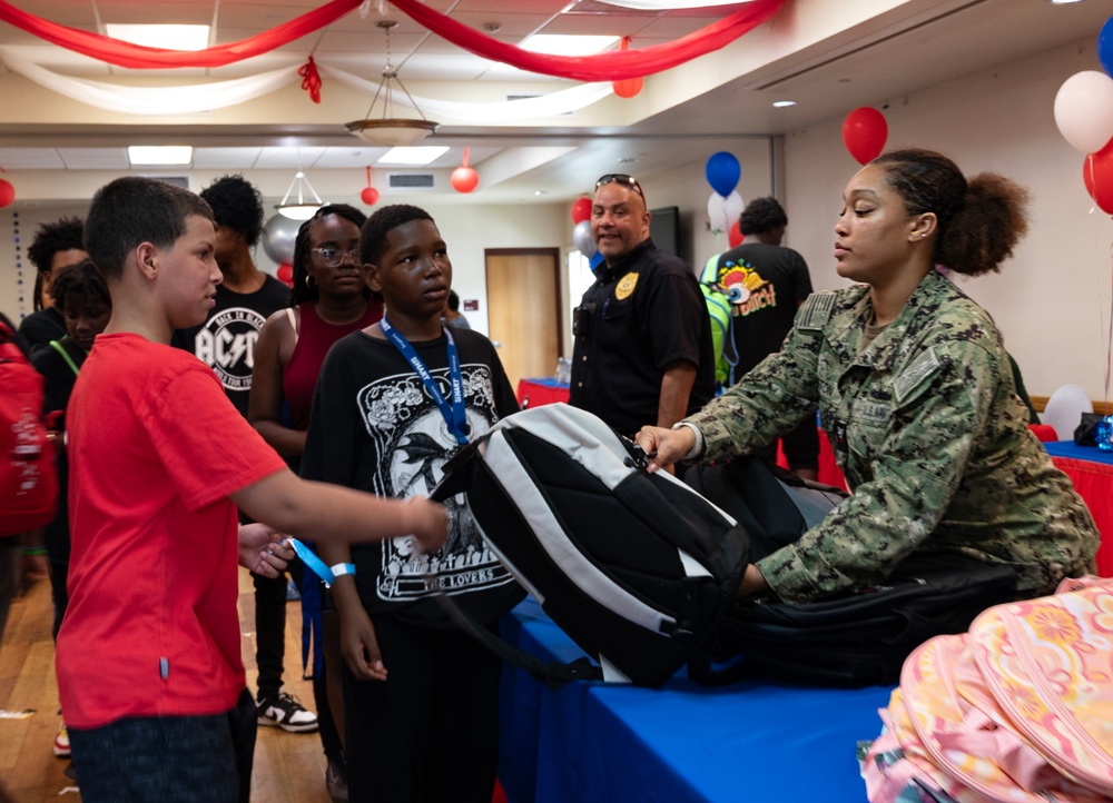 Sailors Volunteer at Tampa Housing Authority’s Back to School Bash