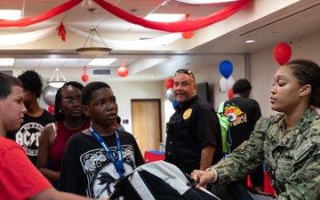 Sailors Volunteer at Tampa Housing Authority’s Back to School Bash