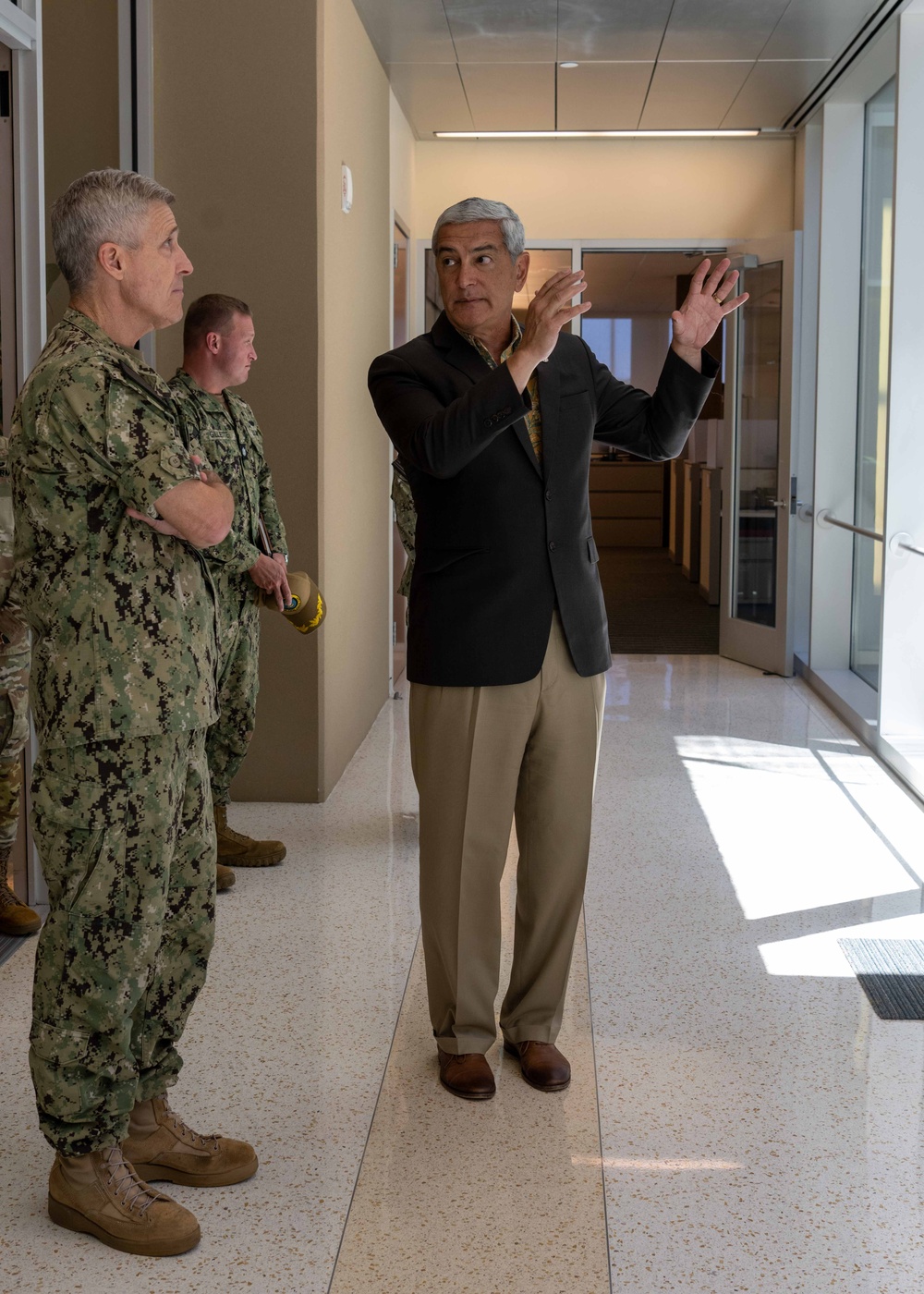 Adm. Steve Koehler tours the Defense POW/MIA Accounting Agency's facility on JBPHH