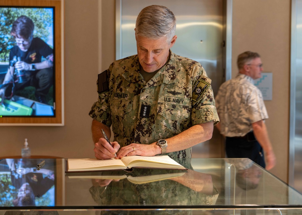 Adm. Steve Koehler tours the Defense POW/MIA Accounting Agency's facility on JBPHH