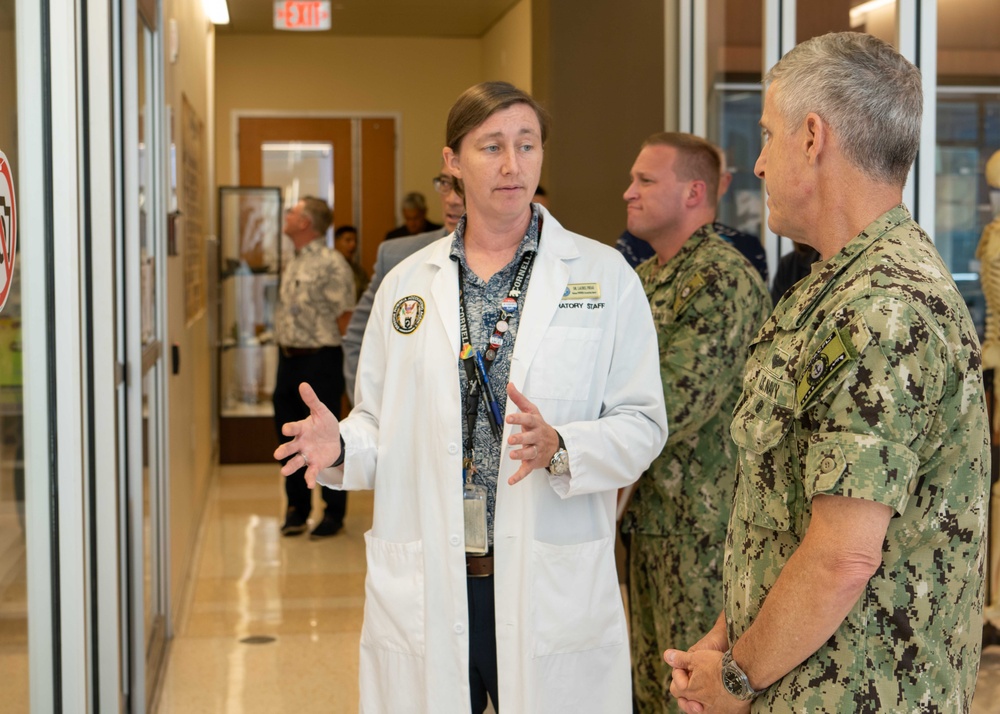 Adm. Steve Koehler tours the Defense POW/MIA Accounting Agency's facility on JBPHH