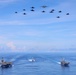 Abraham Lincoln Carrier Strike Group and Cavour Carrier Strike Group Sail in the Pacific Ocean