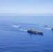 Abraham Lincoln Carrier Strike Group and Cavour Carrier Strike Group Sail in the Pacific Ocean