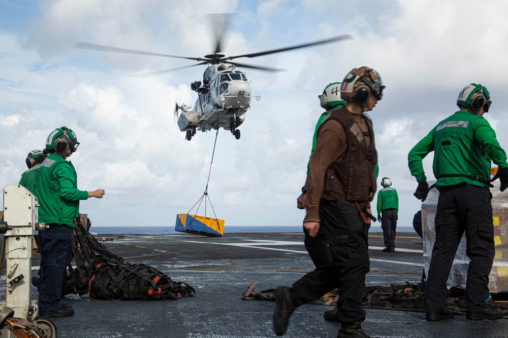 Abraham Lincoln receives cargo during a vertical replenishment