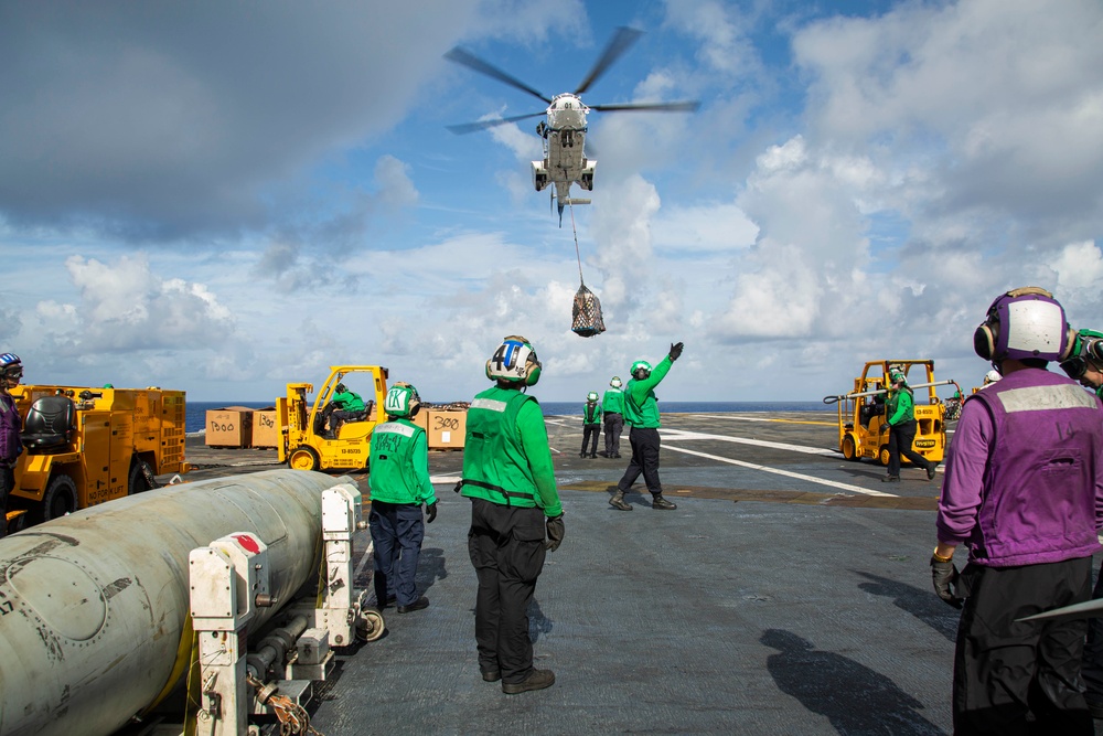 Abraham Lincoln receives cargo during a vertical replenishment