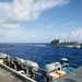 Abraham Lincoln receives cargo during a vertical replenishment