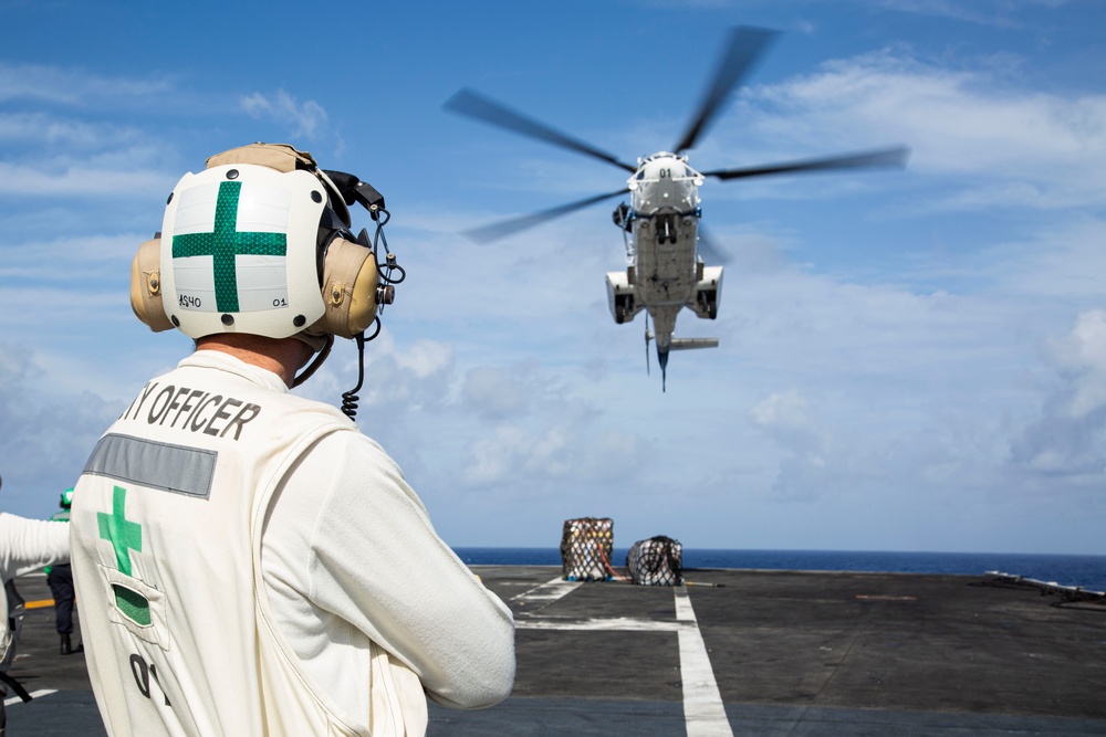 Abraham Lincoln receives cargo during a vertical replenishment