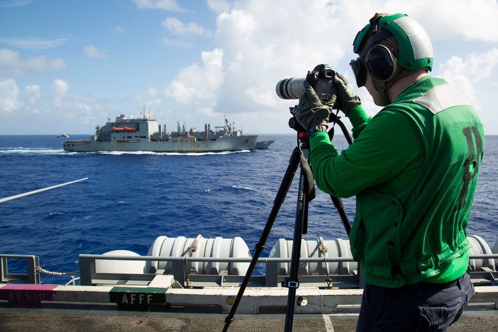 Abraham Lincoln receives cargo during a vertical replenishment