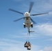 Abraham Lincoln receives cargo during a vertical replenishment