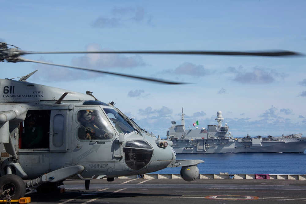 Abraham Lincoln Carrier Strike Group and Cavour Carrier Strike Group Sail in the Pacific Ocean