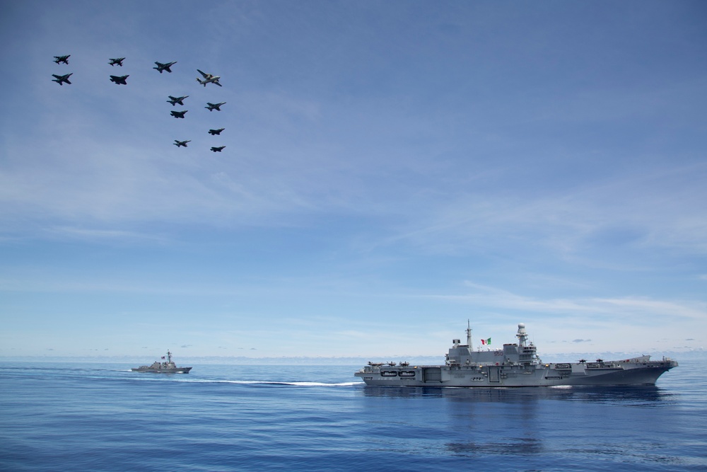 Abraham Lincoln Carrier Strike Group and Cavour Carrier Strike Group Sail in the Pacific Ocean