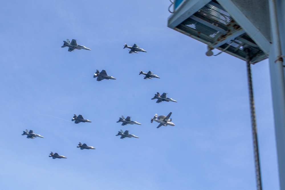 Abraham Lincoln Carrier Strike Group and Cavour Carrier Strike Group sail in the Pacific Ocean