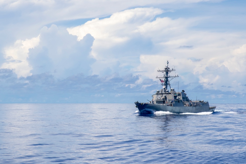 Abraham Lincoln Carrier Strike Group and Cavour Carrier Strike Group sail in the Pacific Ocean