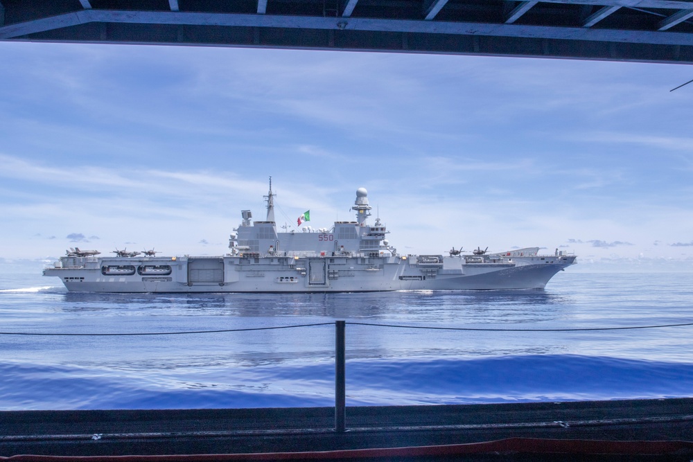 Abraham Lincoln Carrier Strike Group and Cavour Carrier Strike Group sail in the Pacific Ocean