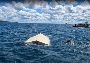 Coast Guard coordinates rescue of five, one dog