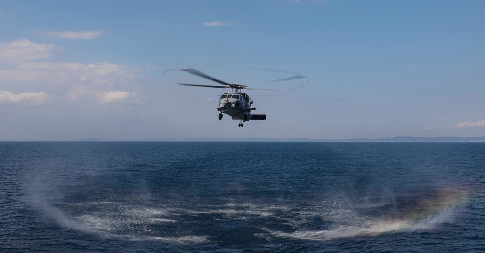 USS Dewey (DDG 105) Conducts Fly-On with HSM-51