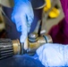 USS Ralph Johnson Sailor Conducts Maintenance