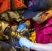 USS Ralph Johnson Sailor Conducts Maintenance