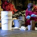 USS Ralph Johnson Sailor Conducts Maintenance