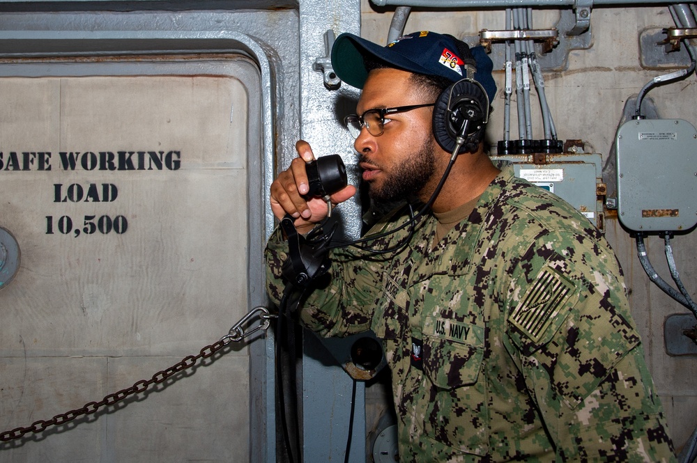USS Ronald Reagan (CVN 76) Sailors transport sonar buoys