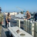 USS Ronald Reagan (CVN 76) Sailors transport sonar buoys