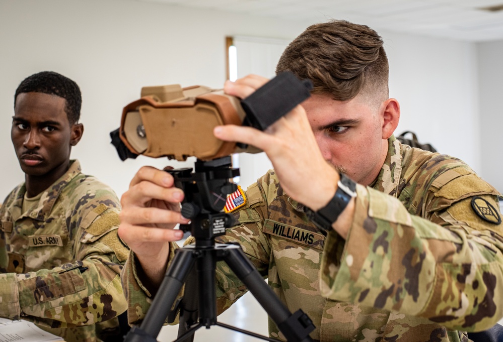 S.C. Army National Guard Soldiers conduct training on a device designed to help Soldiers locate designated targets accurately
