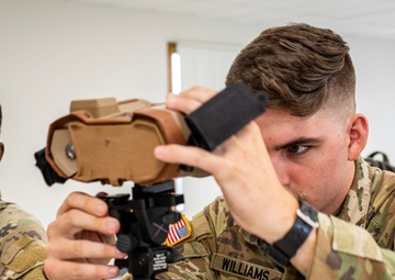 S.C. Army National Guard Soldiers conduct training on a device designed to help Soldiers locate designated targets accurately