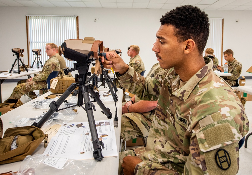 S.C. Army National Guard Soldiers conduct training on a device designed to help Soldiers locate designated targets accurately