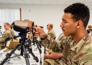 S.C. Army National Guard Soldiers conduct training on a device designed to help Soldiers locate designated targets accurately