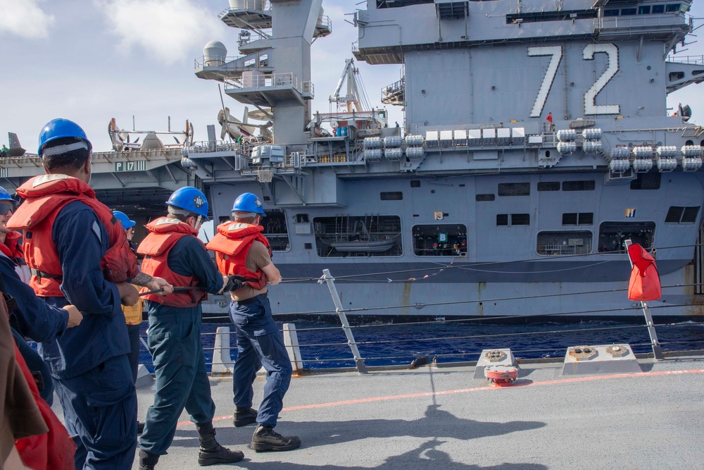 USS Spruance conducts replenishment-at-sea with USS Abraham Lincoln