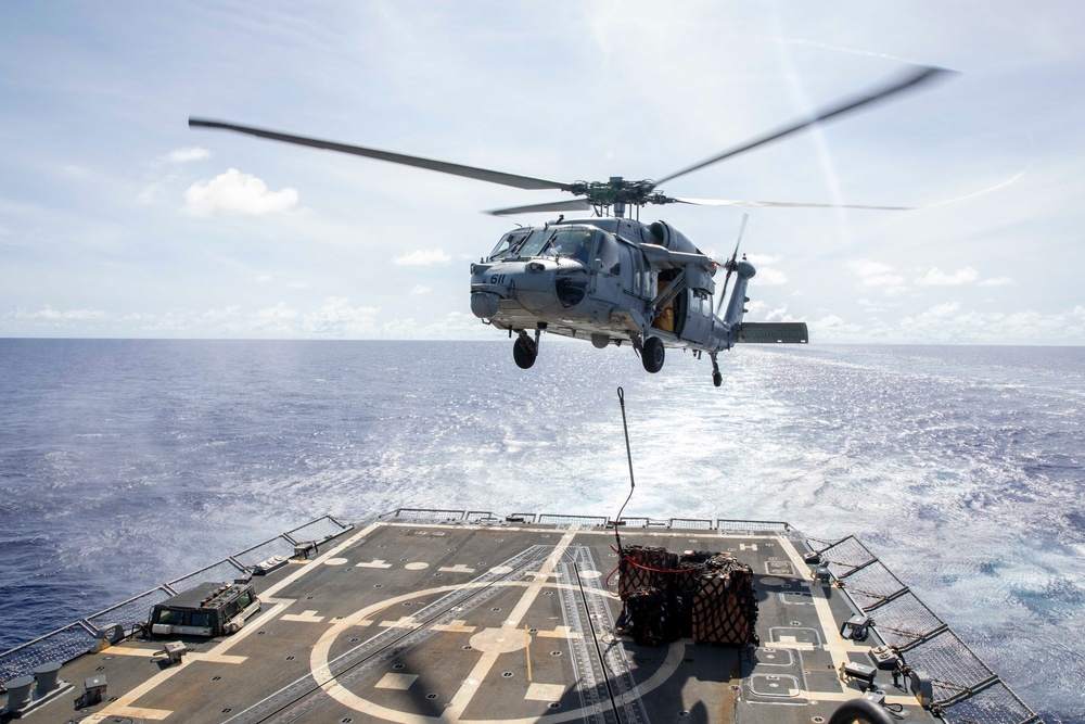 USS Spruance conducts replenishment-at-sea with USS Abraham Lincoln