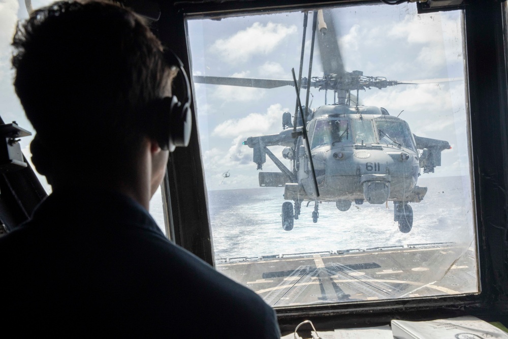 USS Spruance conducts replenishment-at-sea with USS Abraham Lincoln