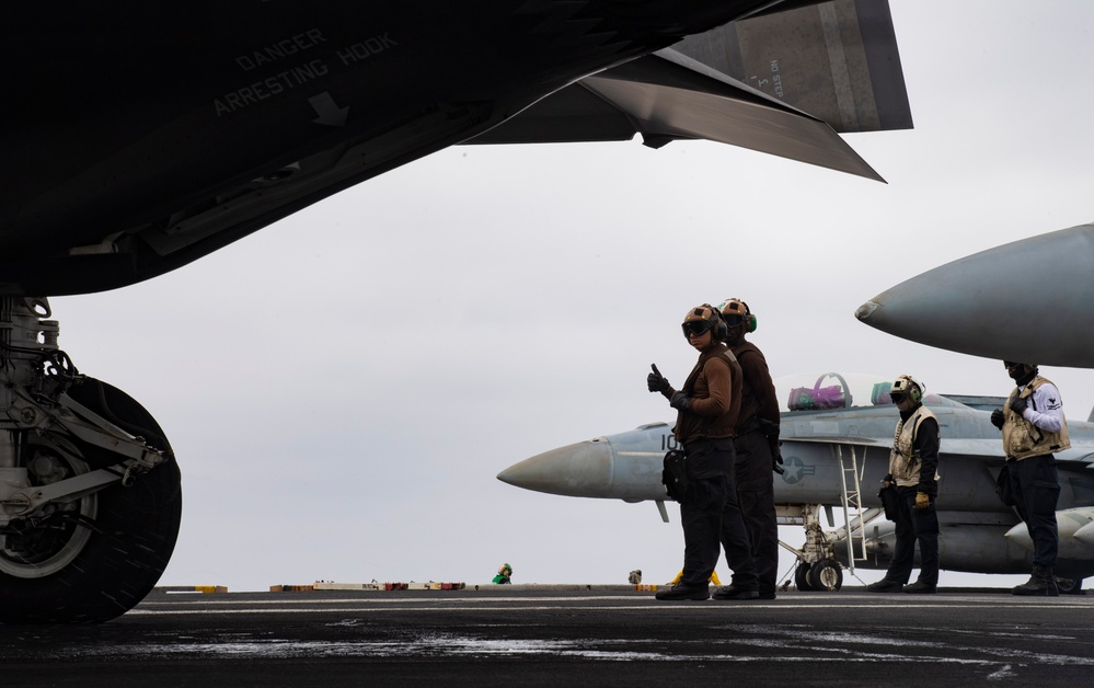 Sailors aboard USS Carl Vinson conduct flight operations