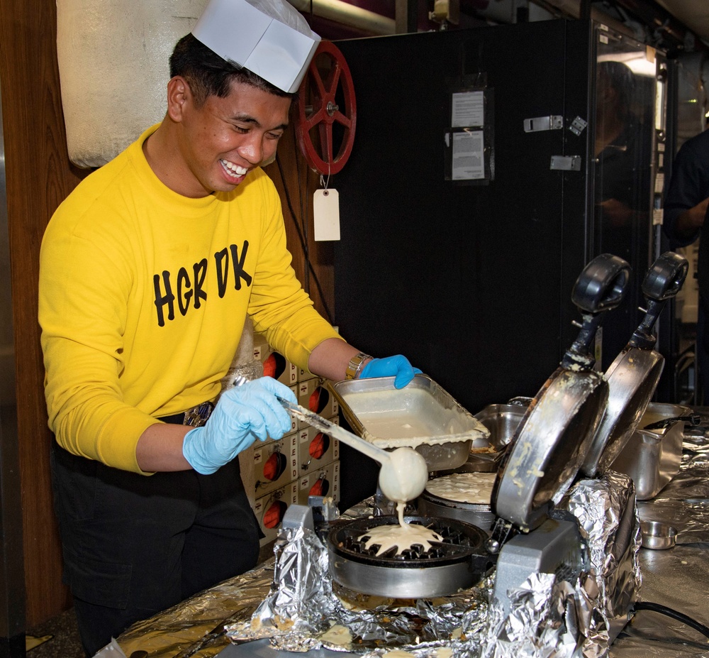Sailors serve brunch aboard USS Carl Vinson