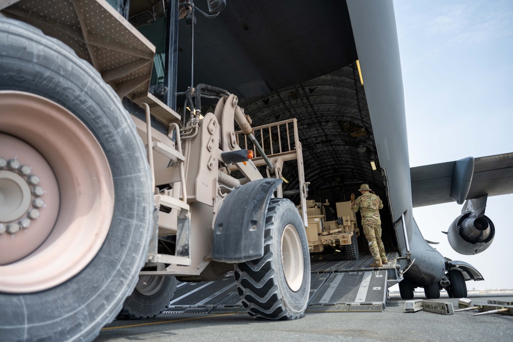 8 EAMS loads equipment onto C-17