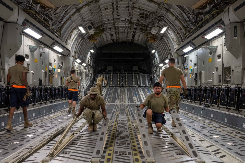8 EAMS loads equipment onto C-17