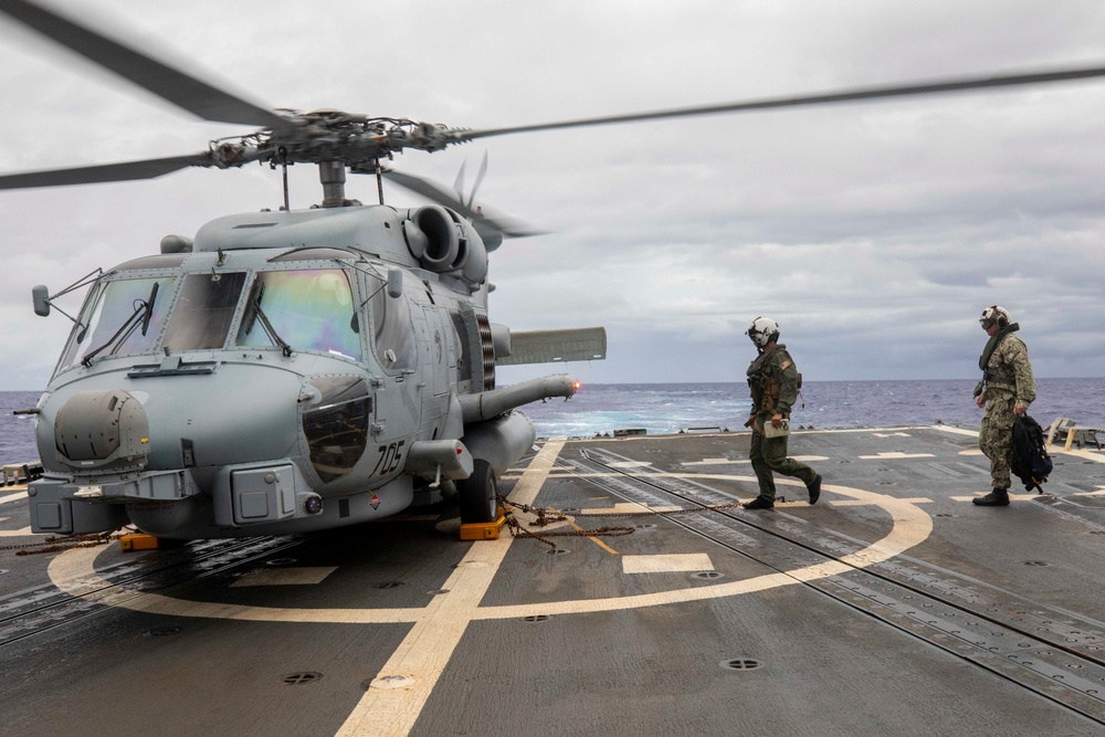 Cmdr. Matt Adams participates in helicopter operations aboard USS Spruance