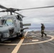 Cmdr. Matt Adams participates in helicopter operations aboard USS Spruance