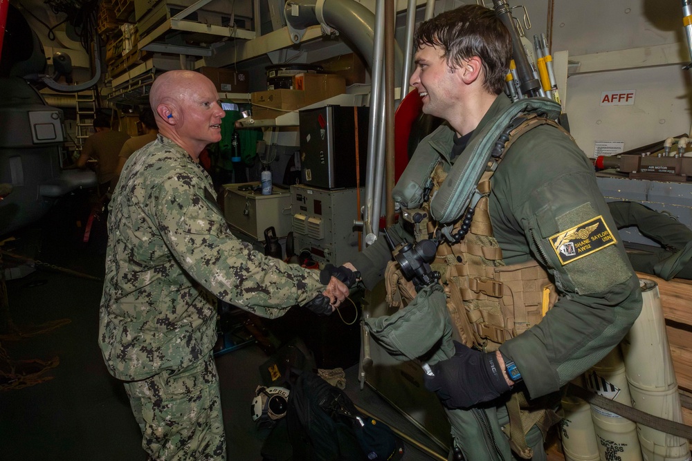 Cmdr. Matt Adams participates in helicopter operations aboard USS Spruance