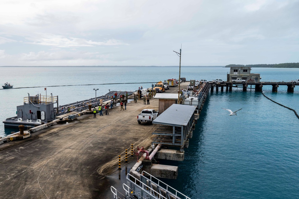 Sailors and Installation Personnel conduct an Oil Spill Simulation Drill